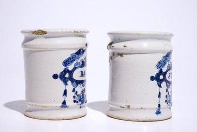 A pair of small Dutch Delft blue and white albarello-shaped pharmacy drug jars, 18th C.