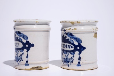 A pair of small Dutch Delft blue and white albarello-shaped pharmacy drug jars, 18th C.