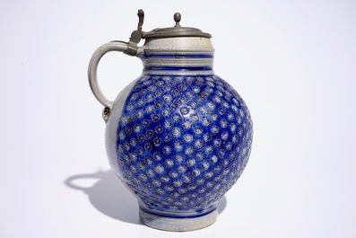 A large globular Westerwald jug with pewter lid, 17th C.
