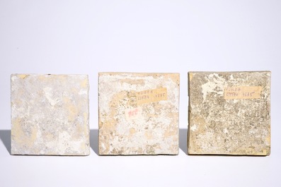 A set of three Dutch Delft tiles with a polychrome bird and chinoiserie design, early 17th C.