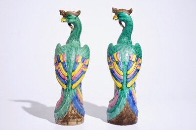 A pair of Chinese famille rose models of phoenixes, early 20th C.