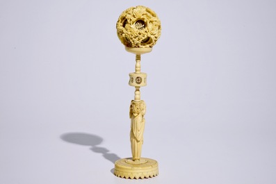 A Chinese carved ivory puzzle ball on stand, Canton, 19th C.