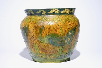 A Flemish pottery jardiniere with peacocks, signed LMV, Torhout, ca. 1900
