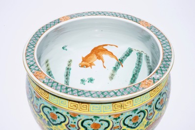 A small Chinese famille verte fish bowl with dragons on a yellow ground, 19th C.