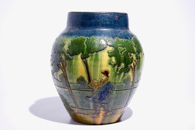 A large Flemish pottery vase with figures below trees, prob. Laigneil, Kortrijk, early 20th C.