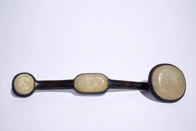 A large Chinese hardwood ruyi sceptre with carved jade panels, 20th C.