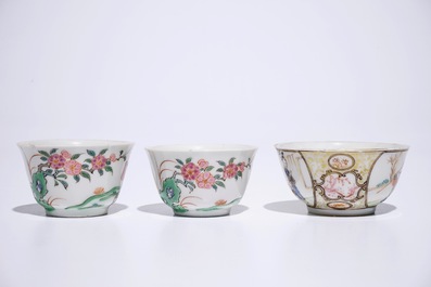 Three Chinese famille rose cups and saucers, one with mandarin design, Yongzheng/Qianlong