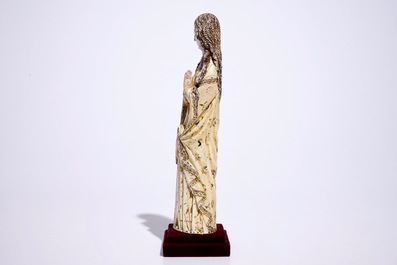 A tall Indo-Portuguese polychrome ivory model of a Madonna, Goa, 17h C.
