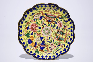 A Chinese Canton enamel cup and saucer and a covered bowl, 18/19th C.