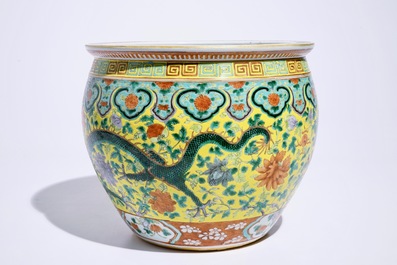 A small Chinese famille verte fish bowl with dragons on a yellow ground, 19th C.