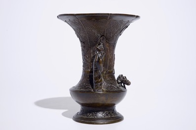 A Chinese bronze vase with applied figures, 19th C.