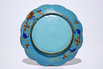 A Chinese Canton enamel cup and saucer and a covered bowl, 18/19th C.