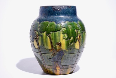 A large Flemish pottery vase with figures below trees, prob. Laigneil, Kortrijk, early 20th C.