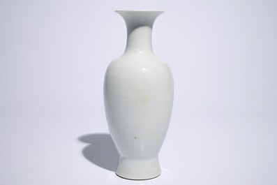 A Chinese famille rose vase with a sage and a boy, Hongxian mark, 20th C.