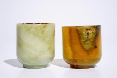 Two Chinese mottled jade wine cups, 20th C.