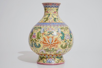 A Chinese famille rose on yellow sgraffiato ground vase in imperial Qianlong style, 20th C.