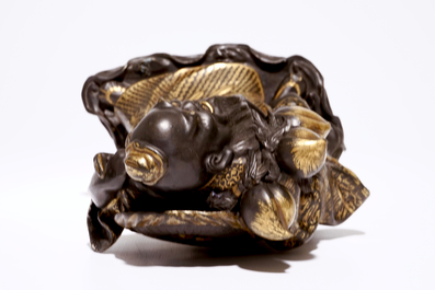 An unusual Chinese black-glazed and gilt model of Shou Lao, 19/20th C.