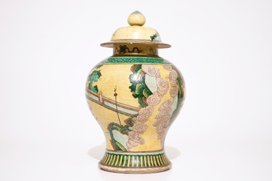 A Chinese famille verte on yellow ground baluster jar and cover, 19th C.