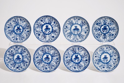 A set of eight Chinese blue and white cups and saucers, 19th C.