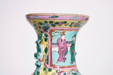 A pair of Chinese famille rose on turquoise ground vases, 19th C., and a vase with Qianlong mark, 20th C.