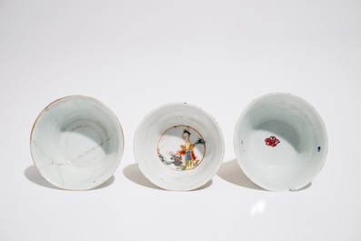 Three Chinese famille rose cups and two saucers, Yongzheng/Qianlong