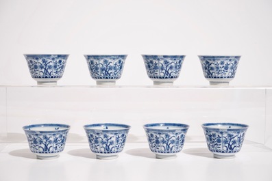 A set of eight Chinese blue and white cups and saucers, 19th C.
