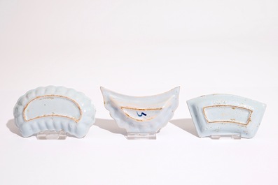 Two English Delft condiment plates and a German N&uuml;rnberg example, 18th C.