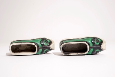 A pair of Chinese verte biscuit brushwashers modelled as shoes, Kangxi