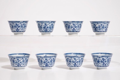 A set of eight Chinese blue and white cups and saucers, 19th C.