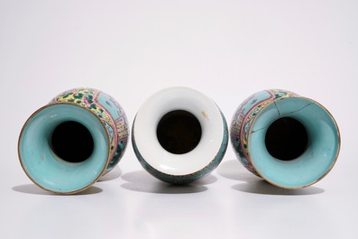 A pair of Chinese famille rose on turquoise ground vases, 19th C., and a vase with Qianlong mark, 20th C.