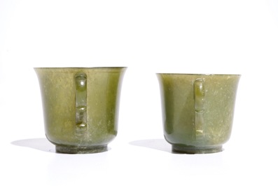 A pair of Chinese green jade cups and saucers, 19th C.