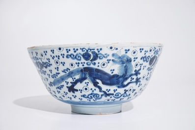 A Dutch Delft blue and white chinoiserie bowl with dragons, late 17th C.