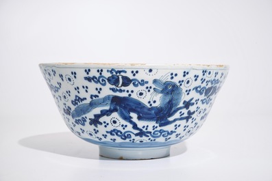 A Dutch Delft blue and white chinoiserie bowl with dragons, late 17th C.