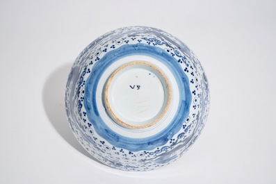 A Dutch Delft blue and white chinoiserie bowl with dragons, late 17th C.