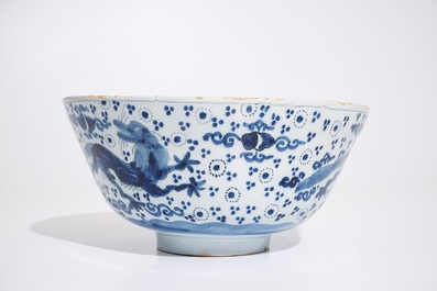 A Dutch Delft blue and white chinoiserie bowl with dragons, late 17th C.