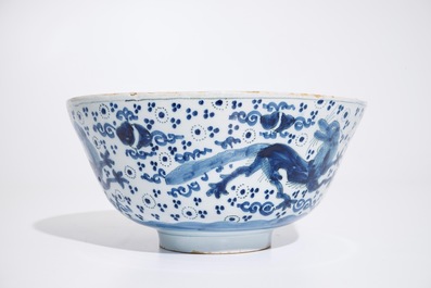 A Dutch Delft blue and white chinoiserie bowl with dragons, late 17th C.