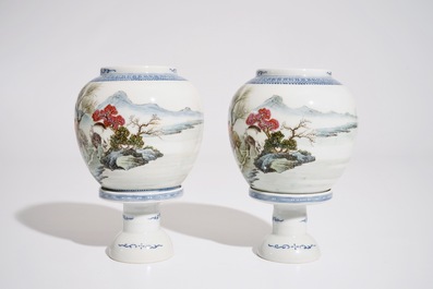 A pair of Chinese famille rose eggshell lanterns on stands, Republic, 20th C.