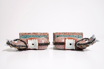 A pair of Dutch Delft polychrome petit feu models of horses, 18th C.