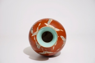 A Chinese coral-ground vase with butterflies, Qianlong mark, 19/20th C.