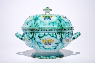 A Brussels faience tureen and cover on stand with butterflies and caterpillars, 18th C.