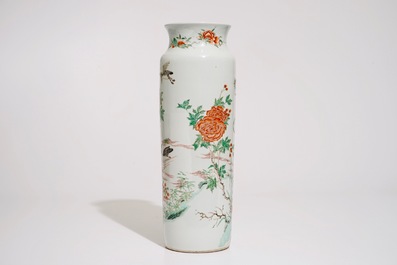 A Chinese wucai sleeve vase with birds in a blossoming landscape, 19th C.