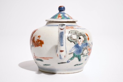 A Chinese wucai teapot and cover with figures in a garden, 19th C.