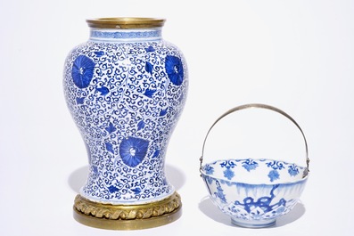 A blue and white Chinese silver-handled bowl, Kangxi mark and of the period, and a bronze-mounted vase, Kangxi