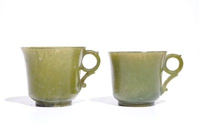A pair of Chinese green jade cups and saucers, 19th C.