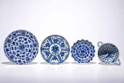 Three Dutch Delft blue and white plates and a two-eared porringer, 17/18th C.