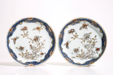 A pair of Chinese grisaille, gilt and iron red cups and saucers and a covered bowl, Qianlong