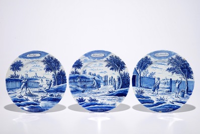 A complete series of twelve Dutch Delft blue and white month plates, Makkum, late 19th C.