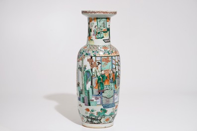 A Chinese famille verte rouleau vase with a court scene, 19th C.