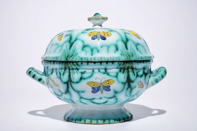 A Brussels faience tureen and cover on stand with butterflies and caterpillars, 18th C.