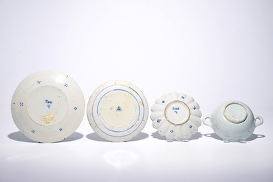 Three Dutch Delft blue and white plates and a two-eared porringer, 17/18th C.